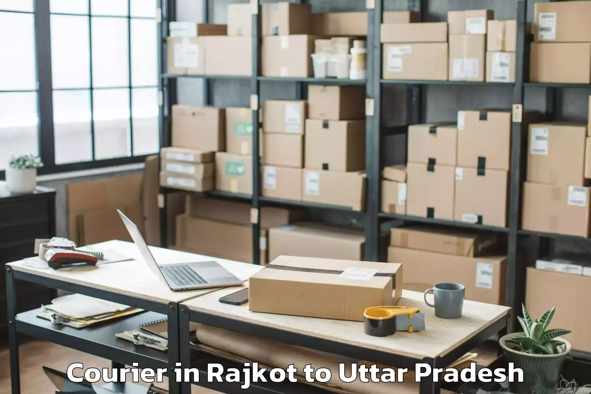 Get Rajkot to Abhilashi University Banda Courier